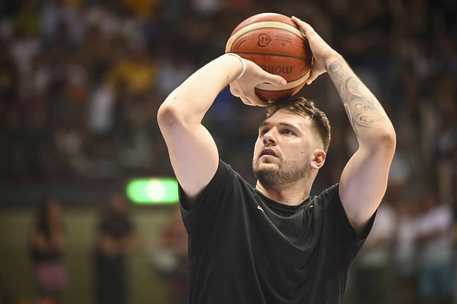 Prijateljska kosarkarska tekma moskih reprezentanc Italije in Slovenije.
Kosarkas Luka Doncic.